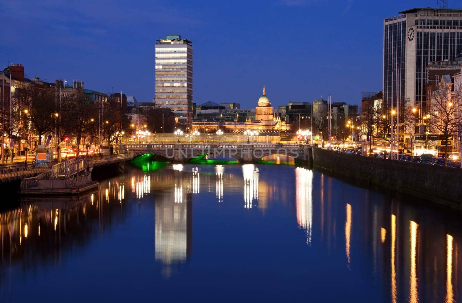 Dublin city at sunset with view over O&#039 Connell Bridge and Liffey river.