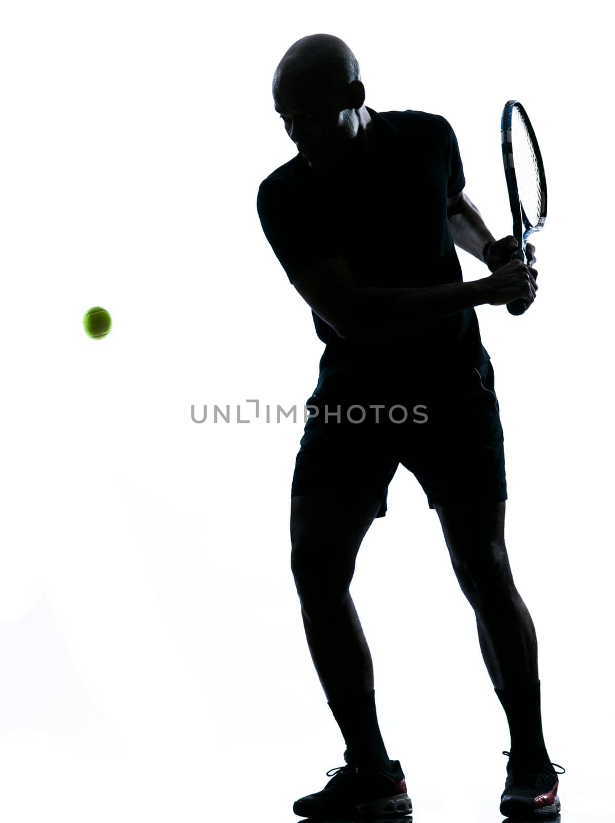 man african afro american playing tennis player backhand, on studio isolated on white background
