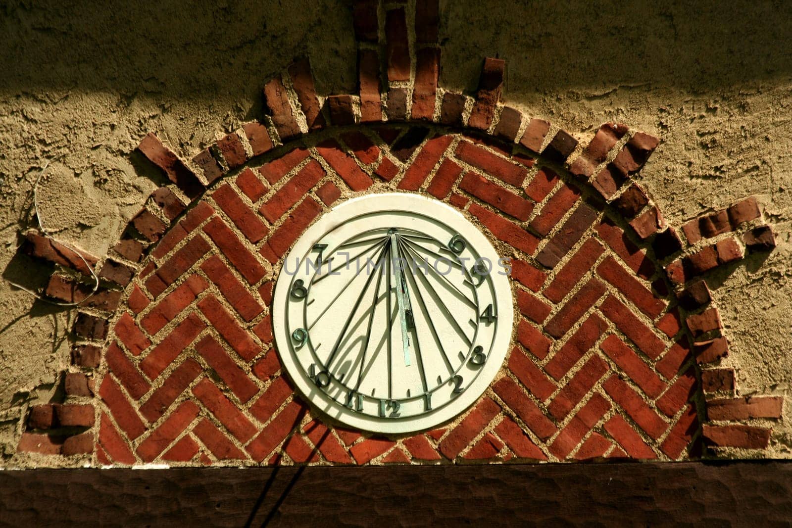 A Old sundial on a building