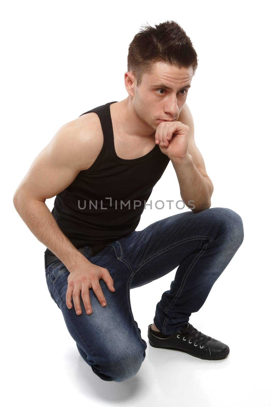 Young sportsman watching carefully something