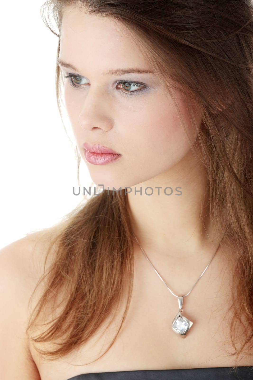 Young elegant woman in black dress, isolated on white