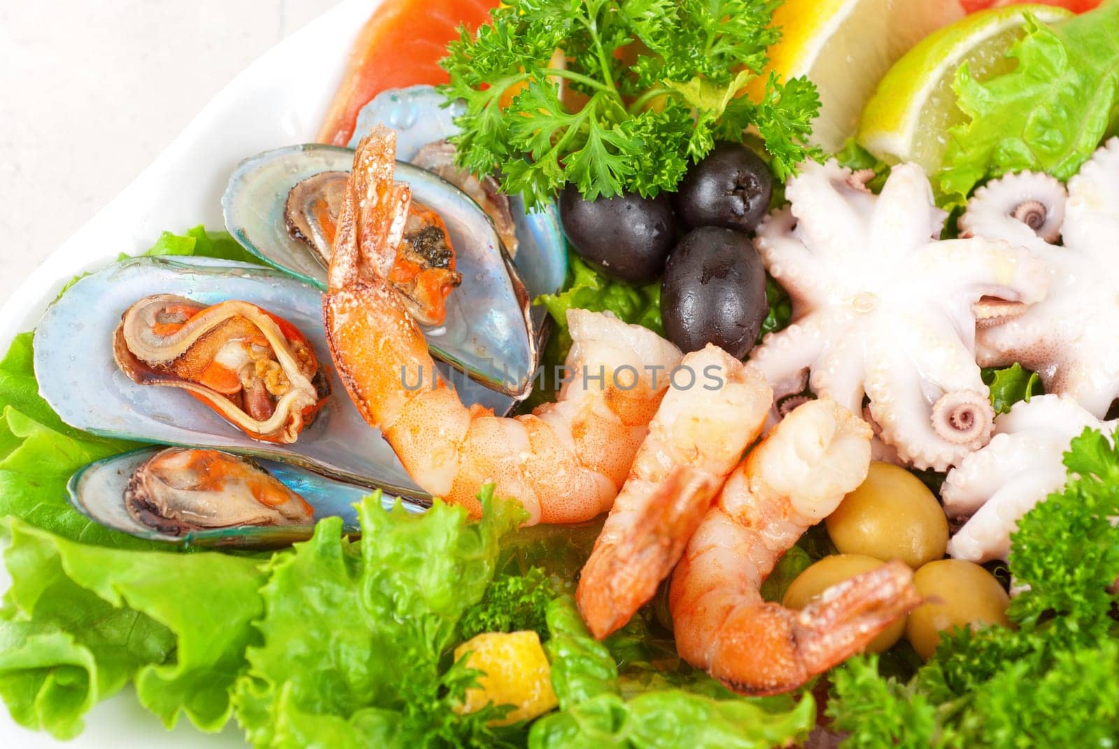 appetizer closeup of different seafood and vegetables