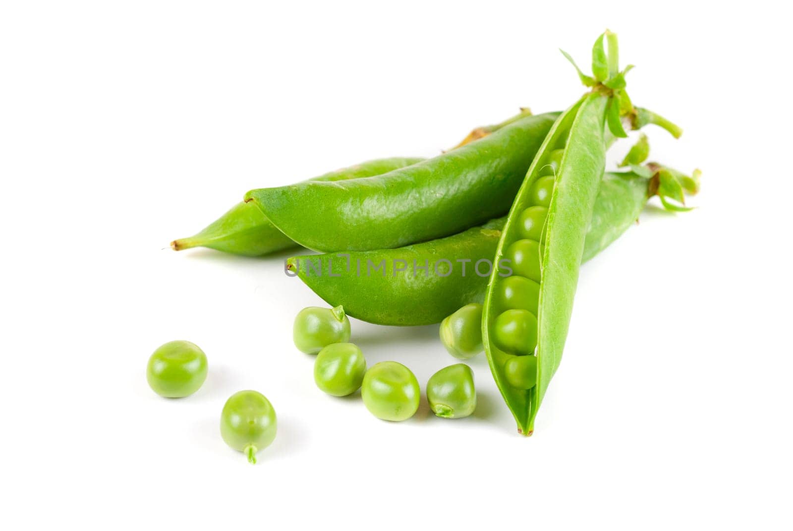 Ripe pea vegetable with green leaf isolated on white background