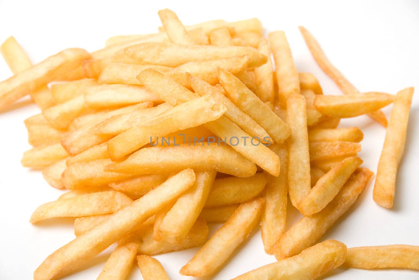 French fried potatoes on a white background