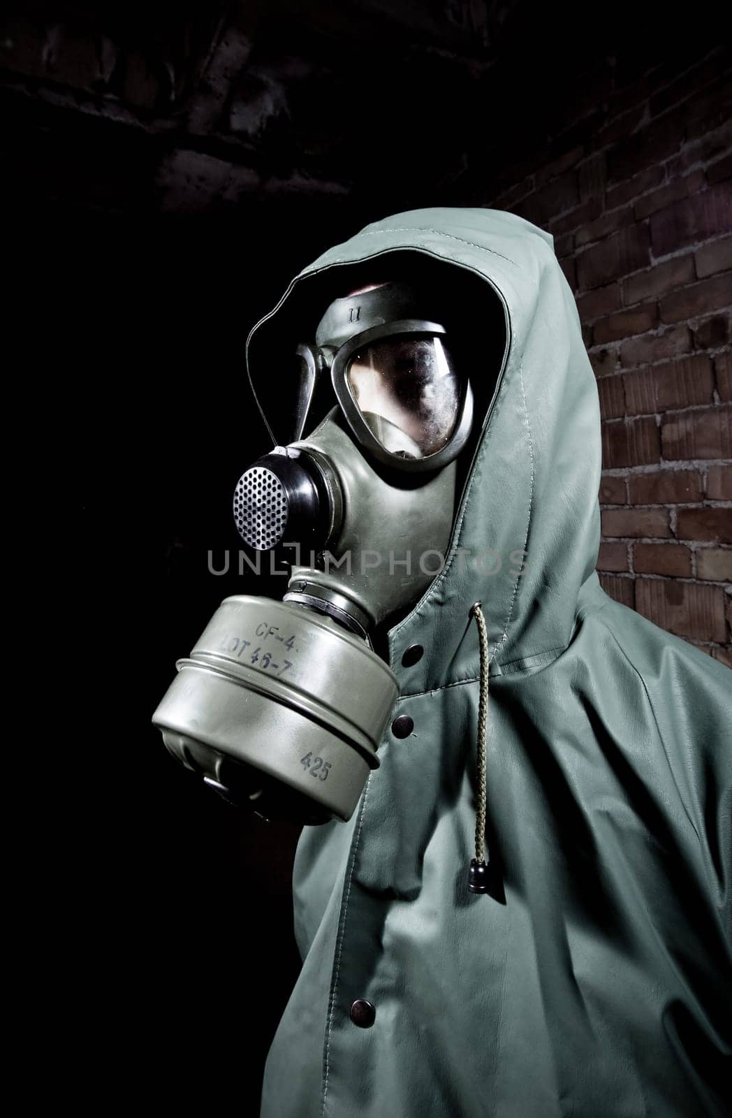 Bizarre portrait of man in gas mask