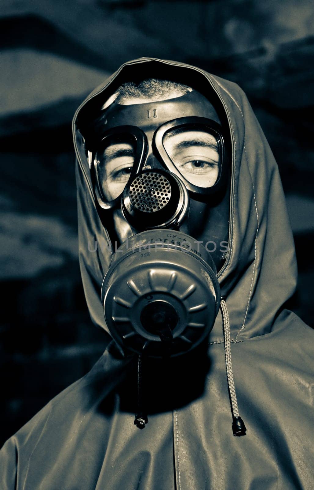 Bizarre portrait of man in gas mask
