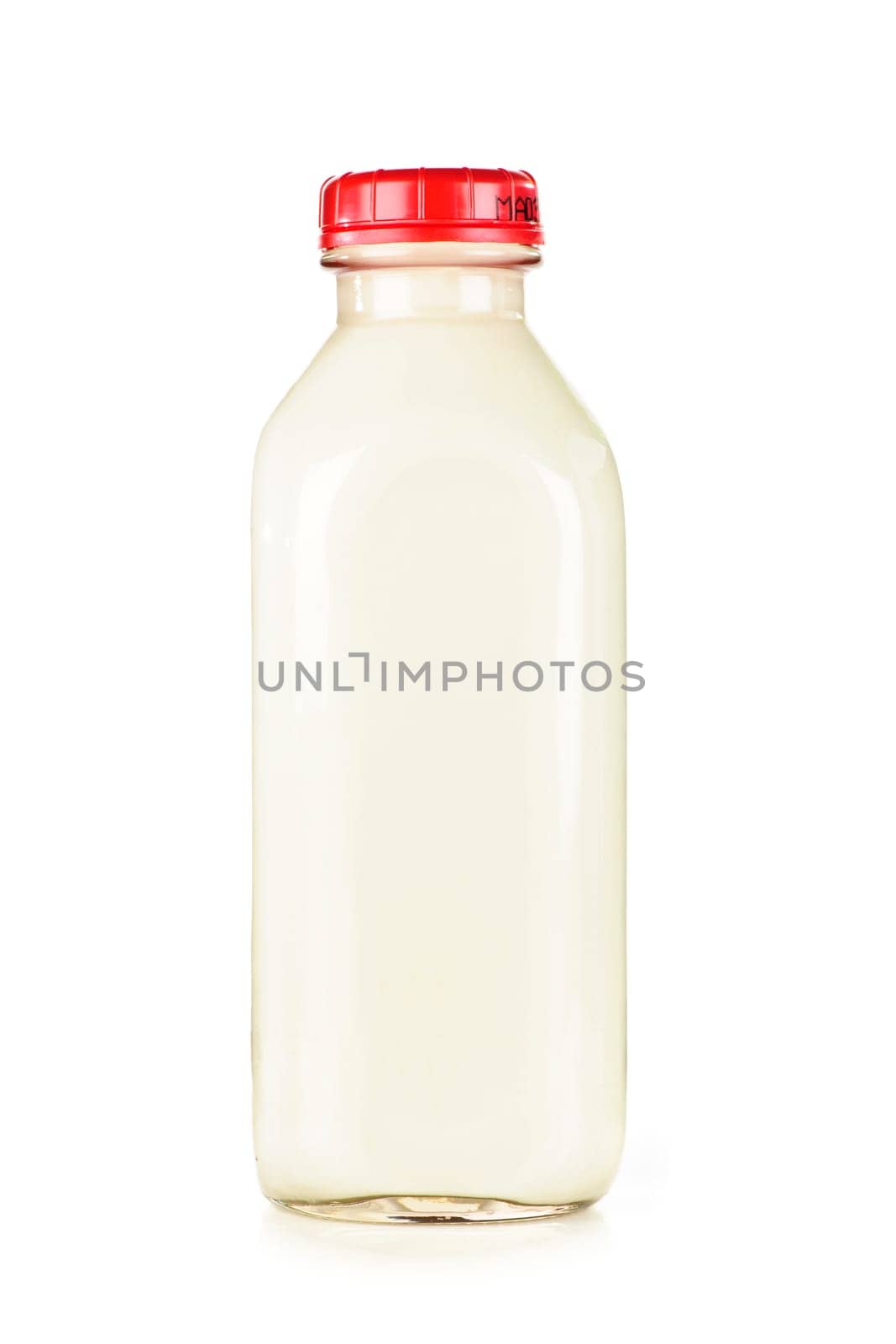 Isolated glass bottle of nutritious white milk