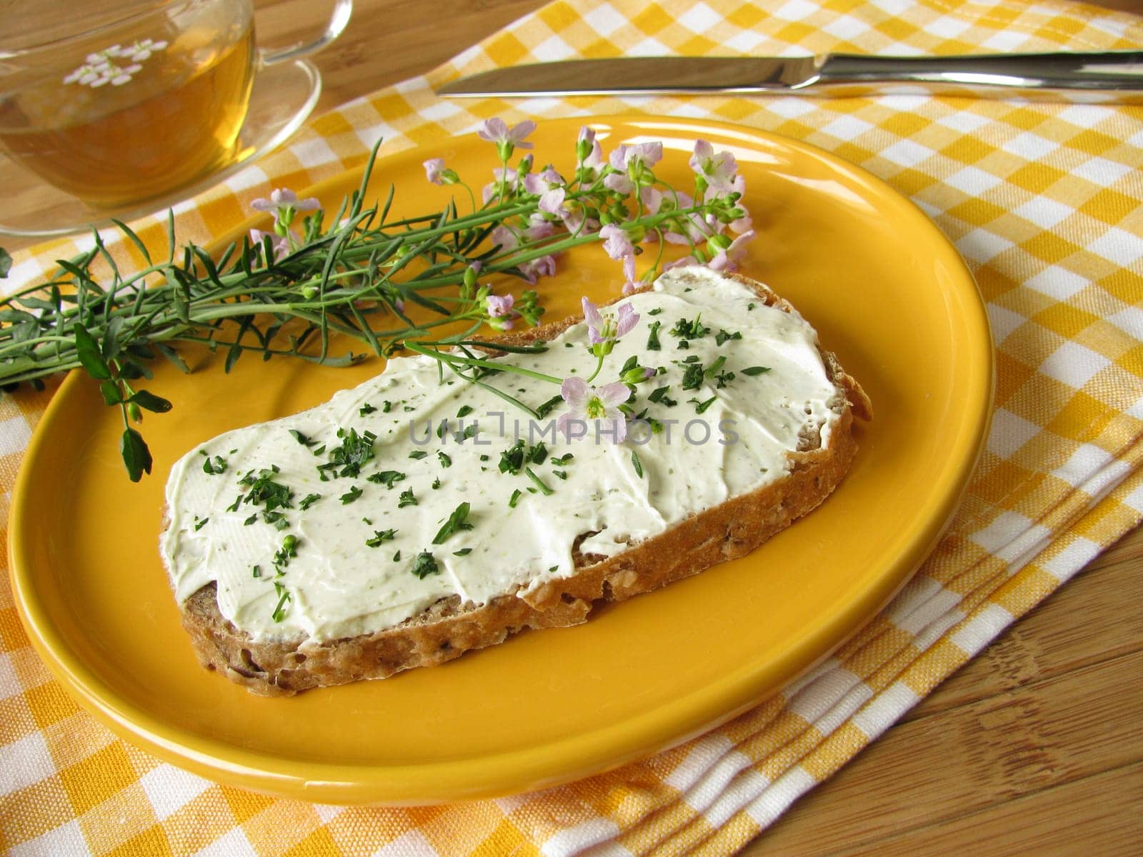 Herb quark with meadowfoam on bread
