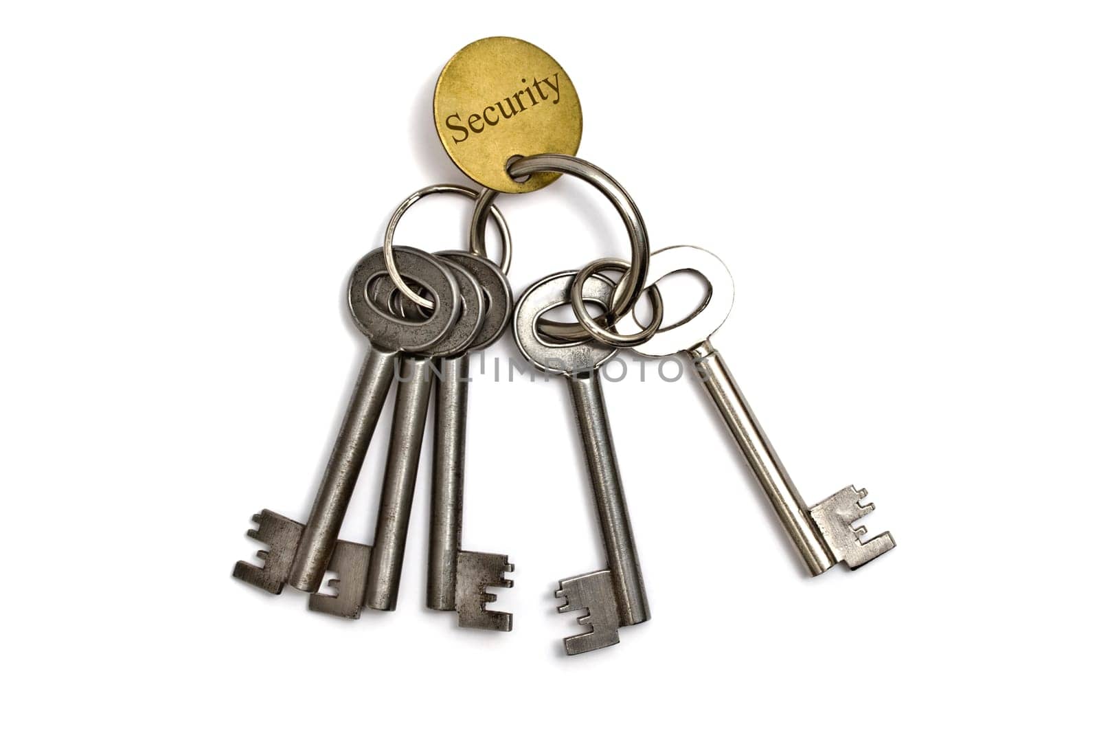 A bunch of old keys isolated on white background