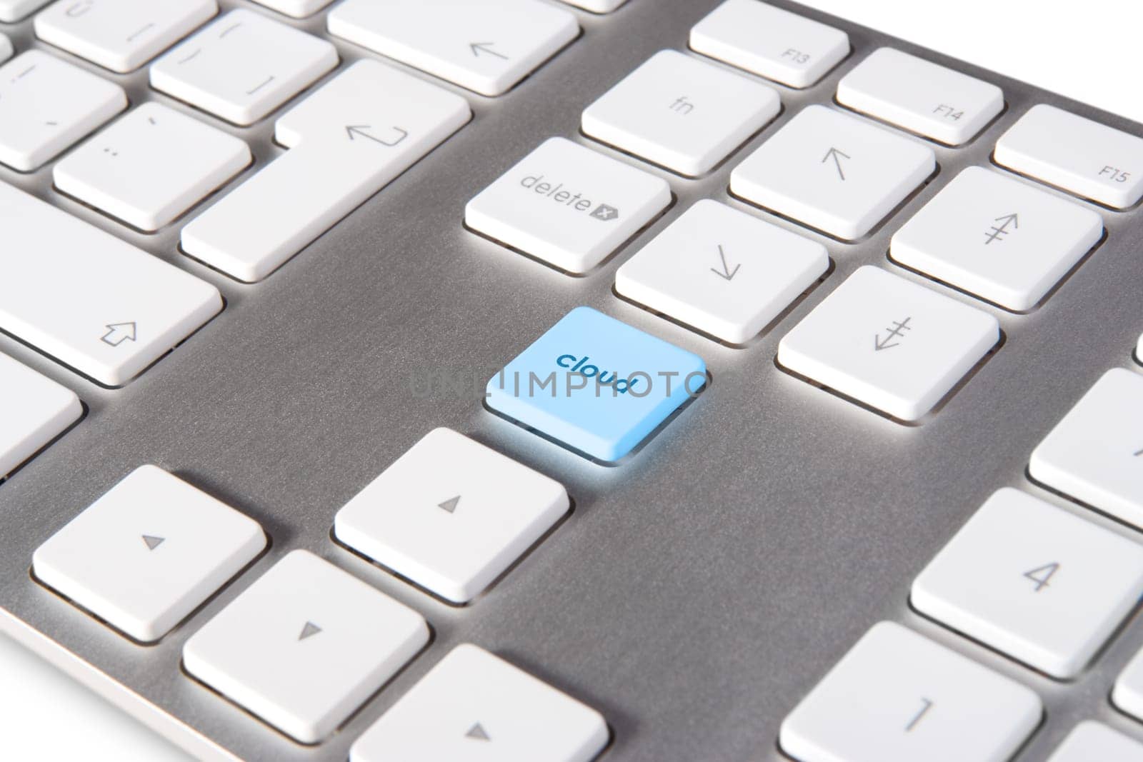 Keyboard with keypad cloud placed in blank space on standard keyboard - cloud computing concept
