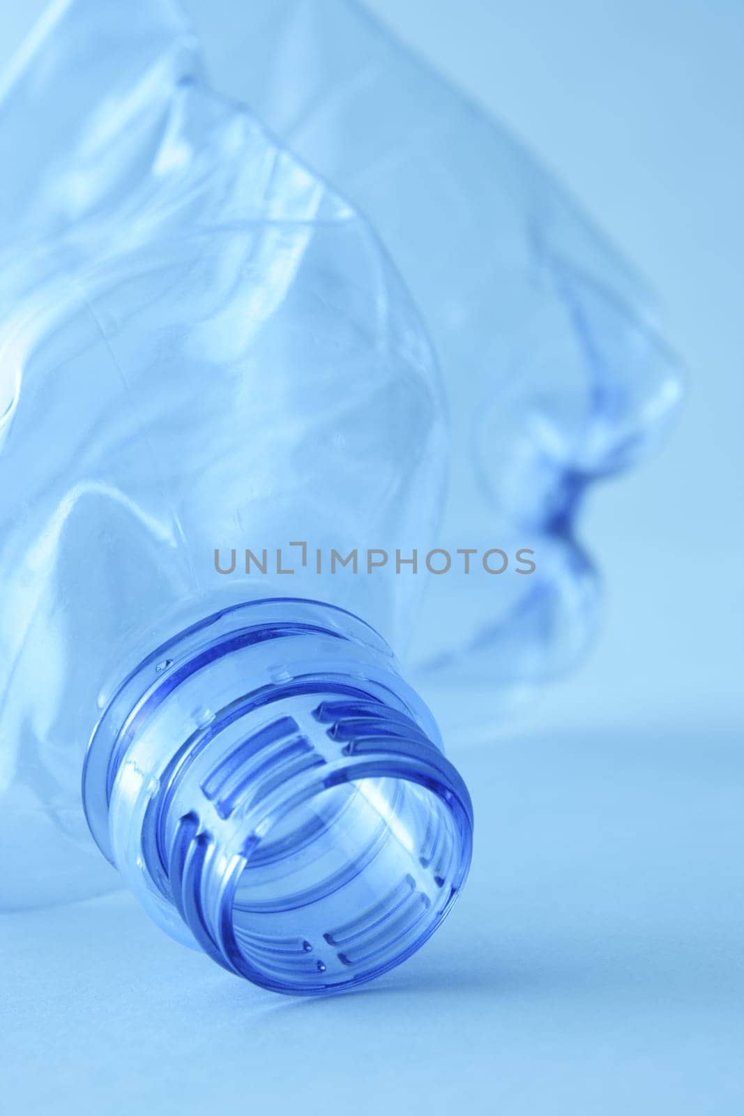 Empty plastic water bottle. Recycle garbage.