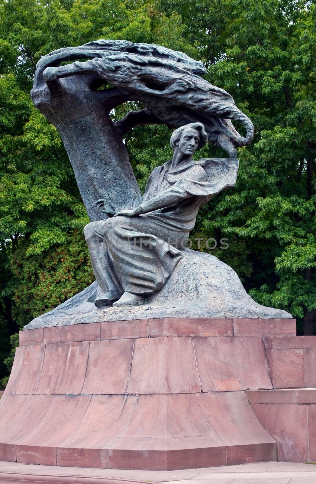 Monument, Frederic Chopin seeking inspiration under a willow tree in Warsaw, Poland.