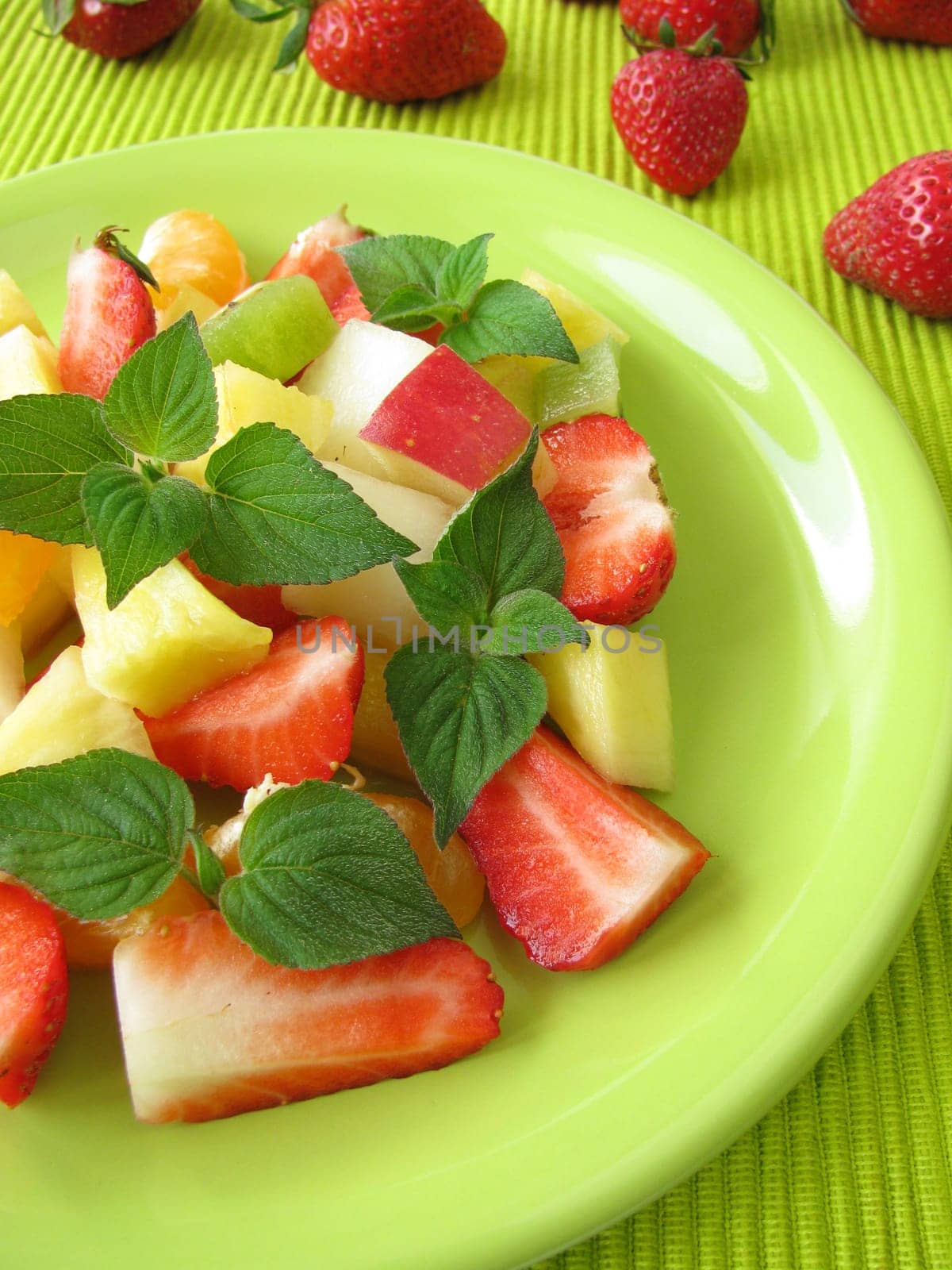 Fruit plate decorated with honeydew melon sage