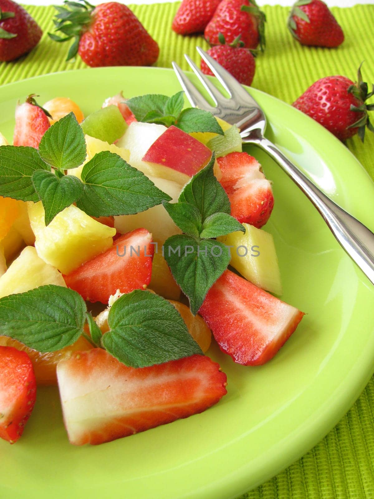 Fruit plate decorated with honeydew melon sage