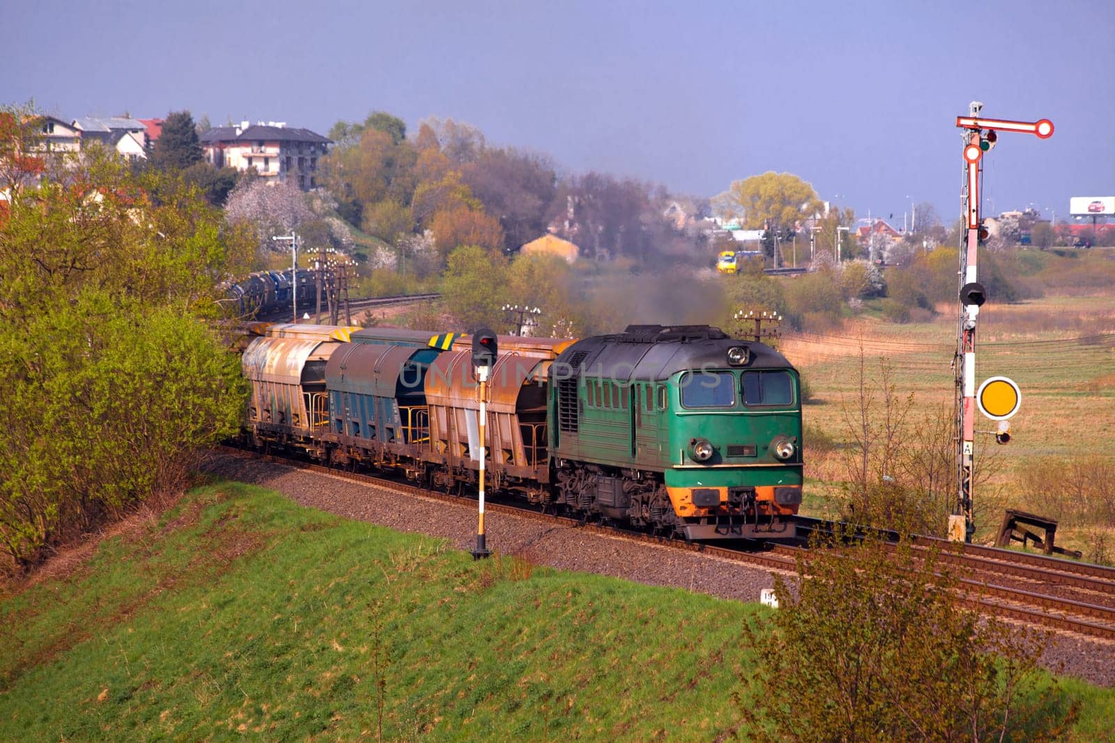 Freight train passing the hilly landscape