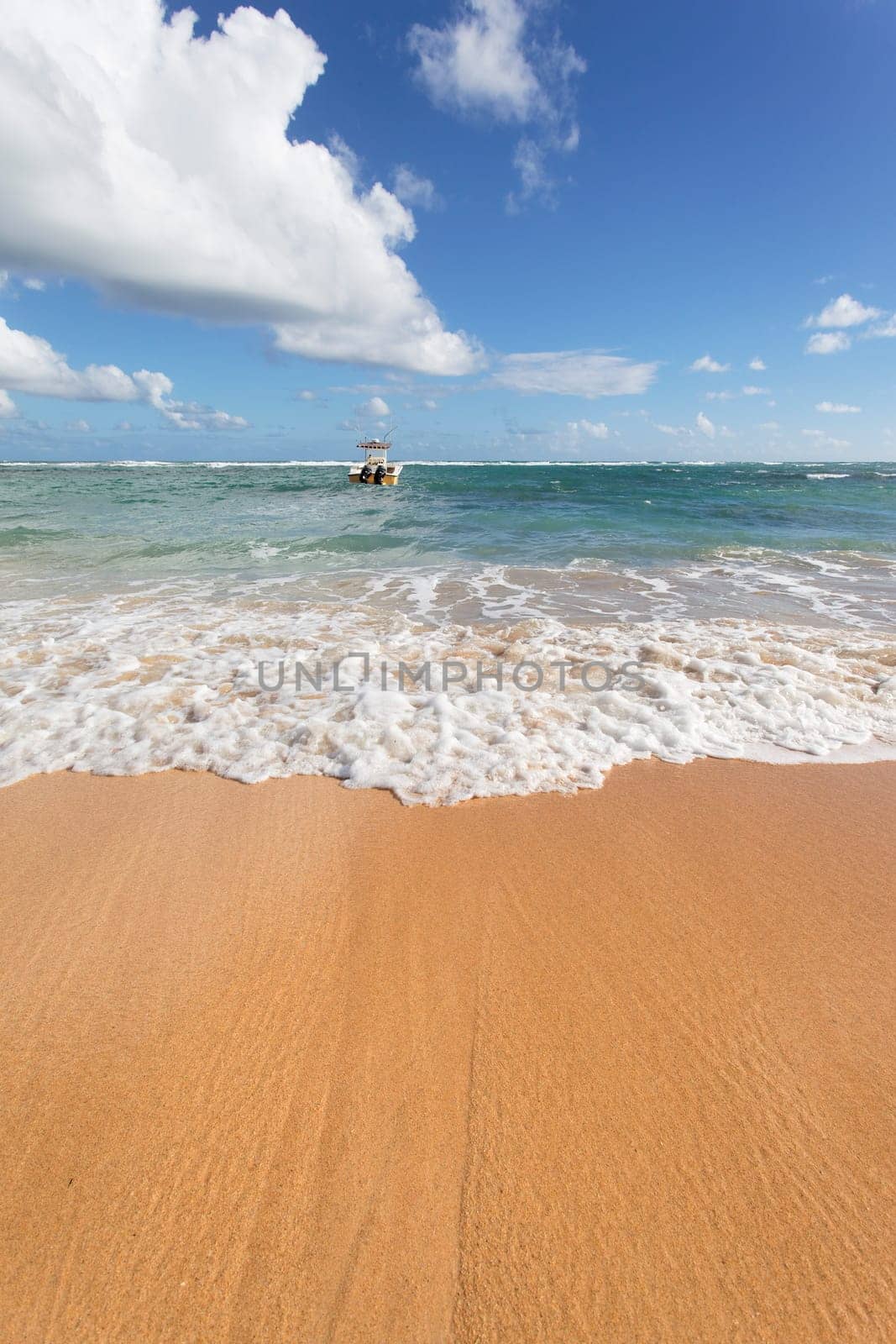 carabean beach and boat on the sea