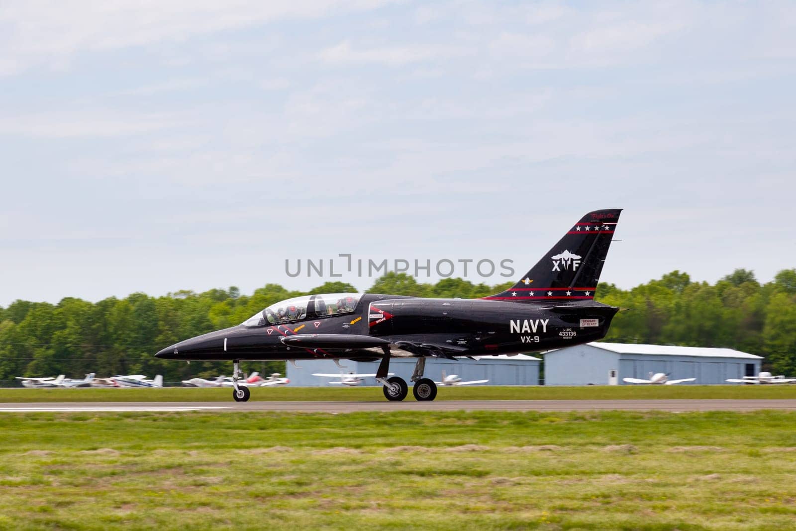 Jet airforce Albatros L-39 fighter training aircraft taking off on runway