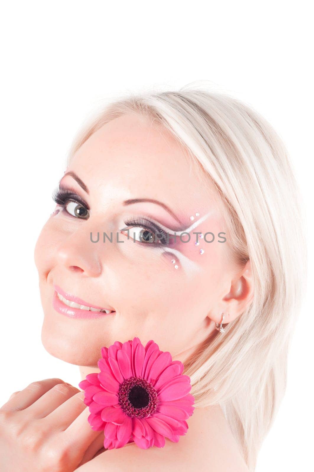 Studio shot of woman with face art isolated on white