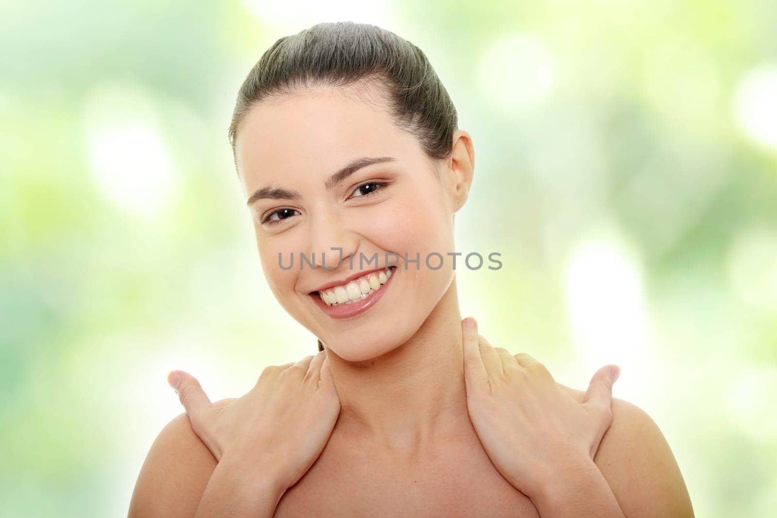 Portrait of the attractive girl without a make-up