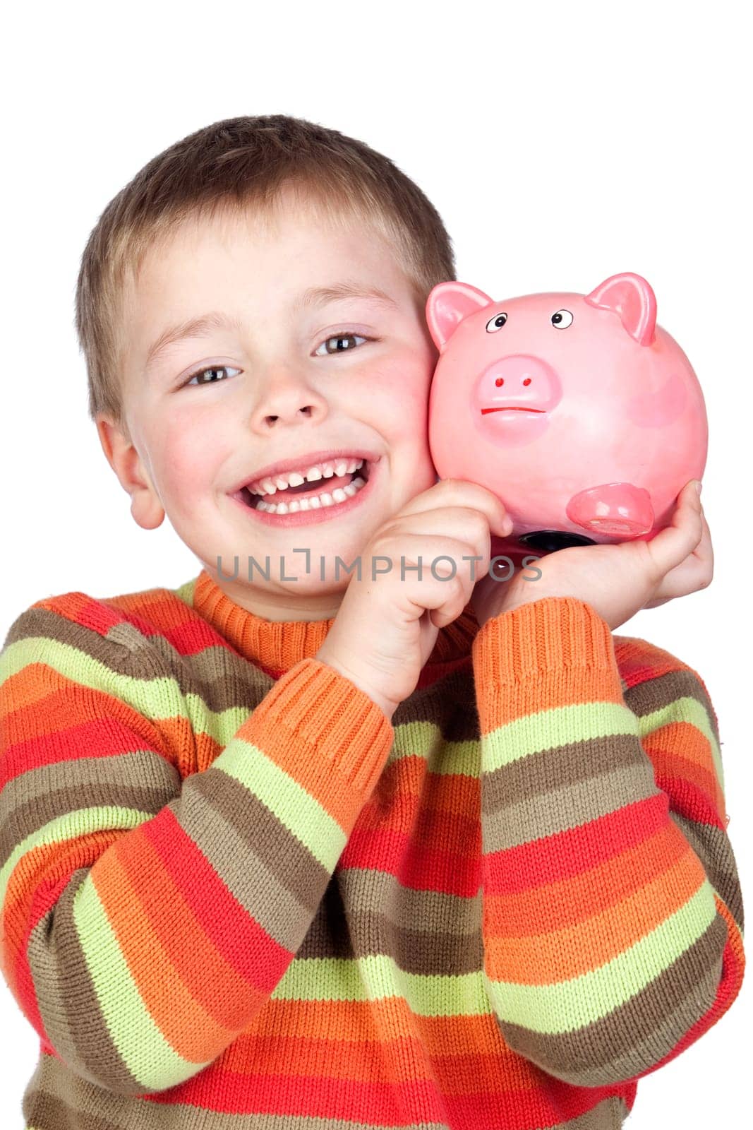 Adorable child with his piggy-bank isolated on white background