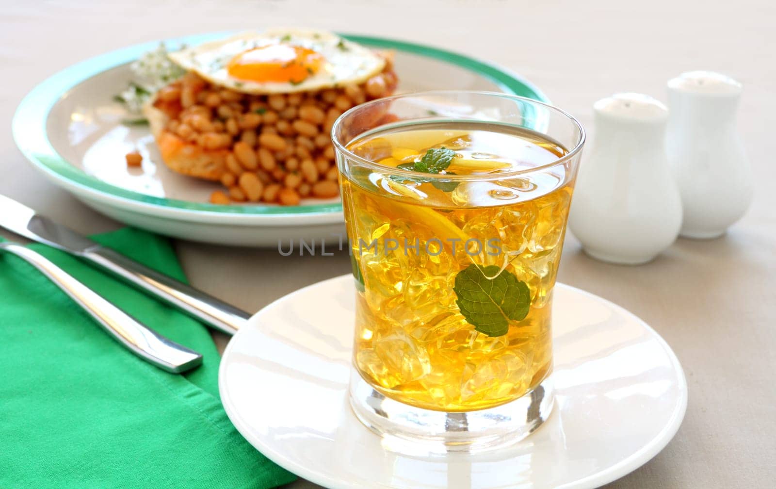 Delightful mint and lemon iced tea with baked beans for breakfast.
