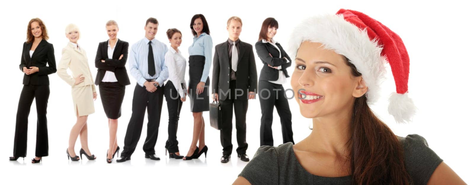 Young business woman in santa hat isolated on white