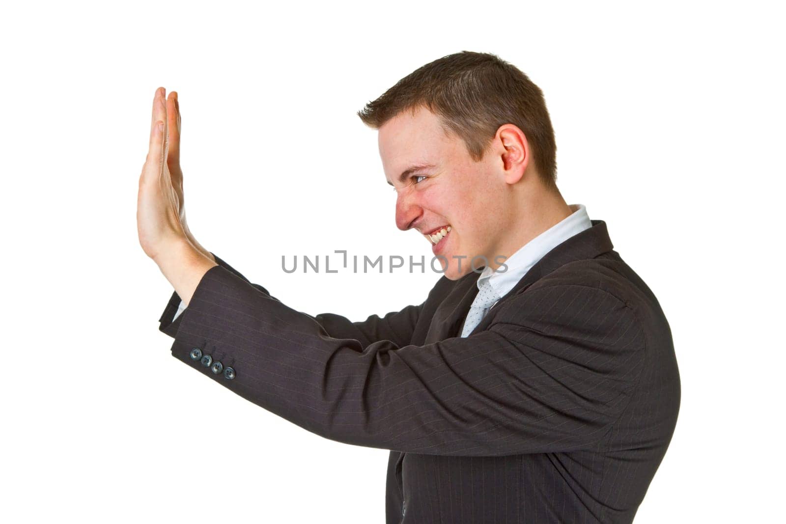 Businessman pushes isolated on white background