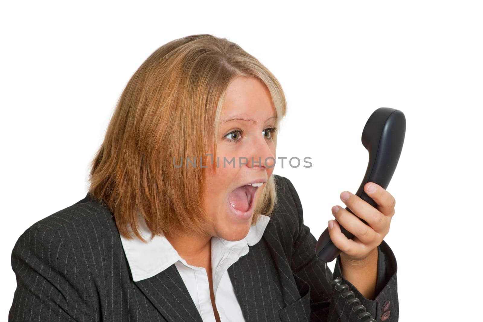 Angry businesswoman on the phone