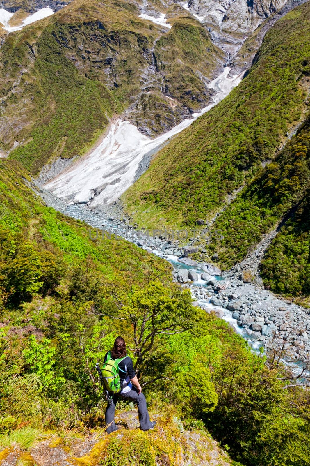 View of mountain stream and snow melt rushing down the mountains
