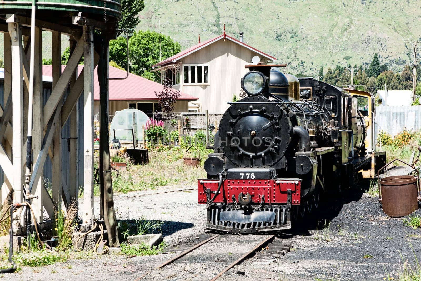 Old train engine perserved at a closed railway station in New Zealand