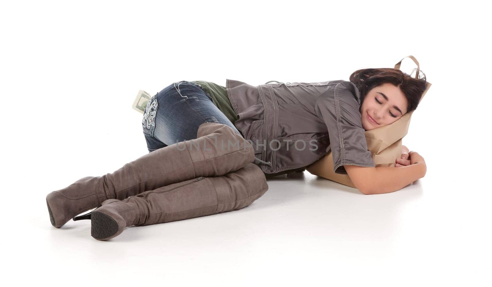 beautiful young teenage woman with shopping bag and cash