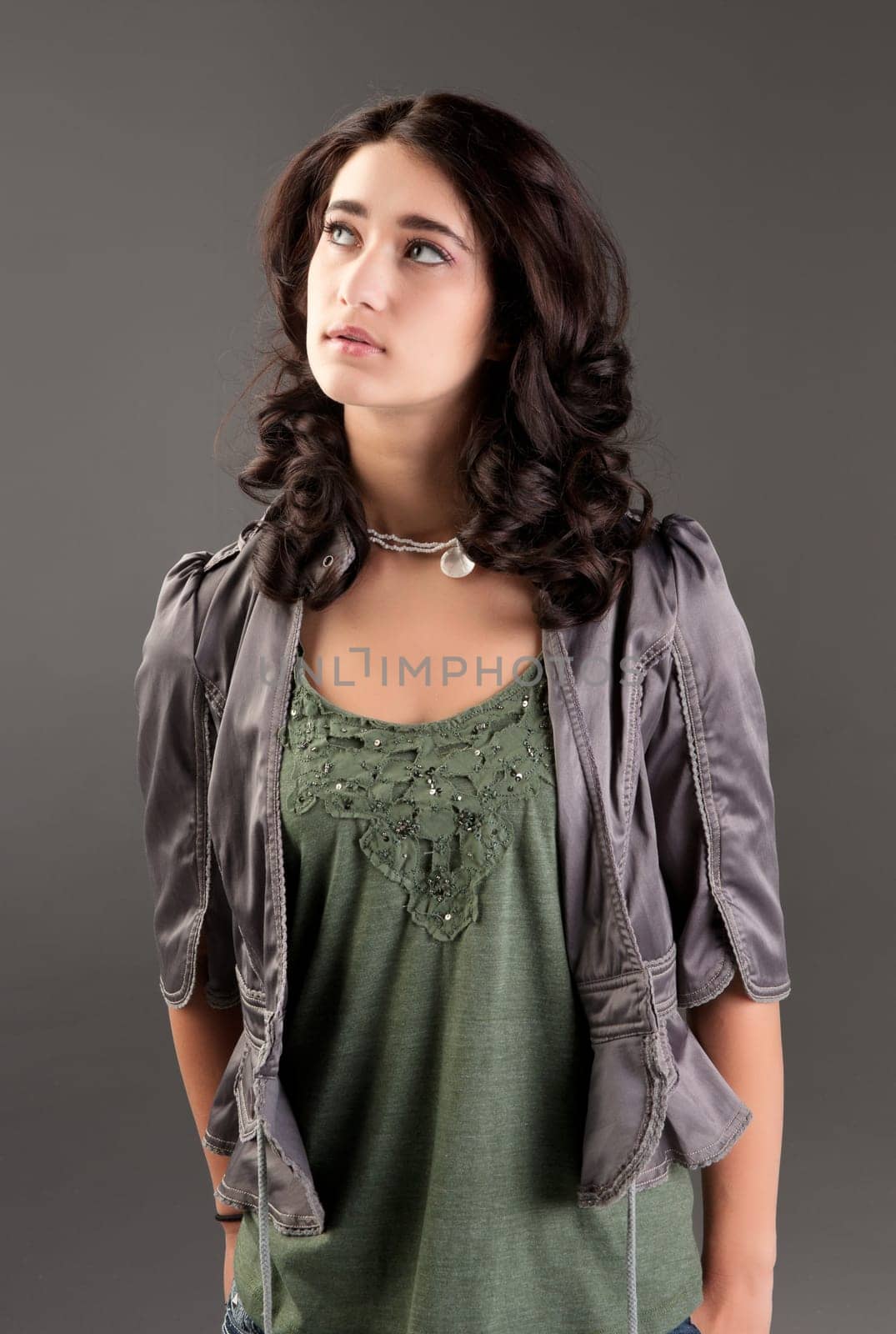 beuatiful young fashion teenager on dark gray