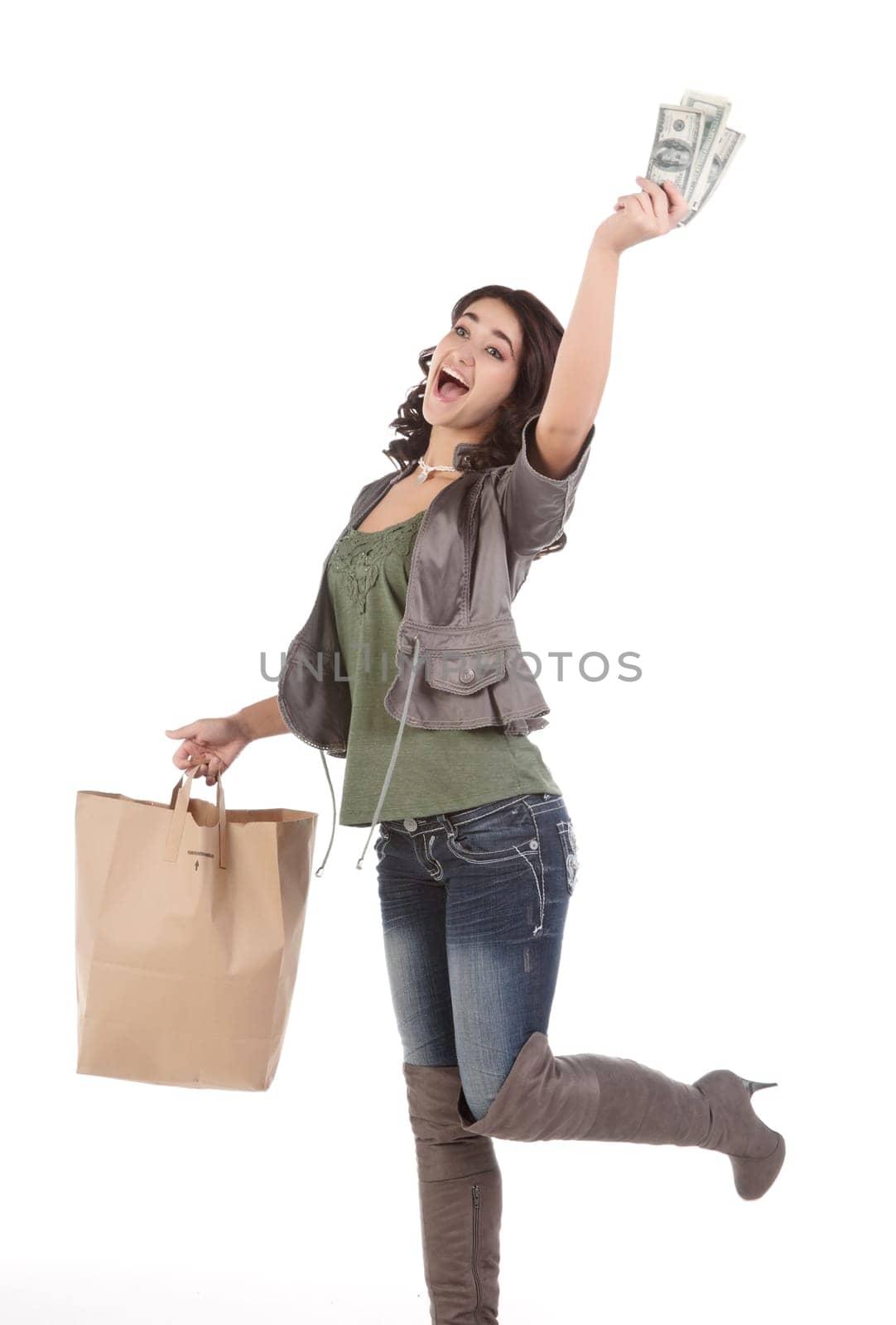 beautiful young teenage woman with shopping bag and cash
