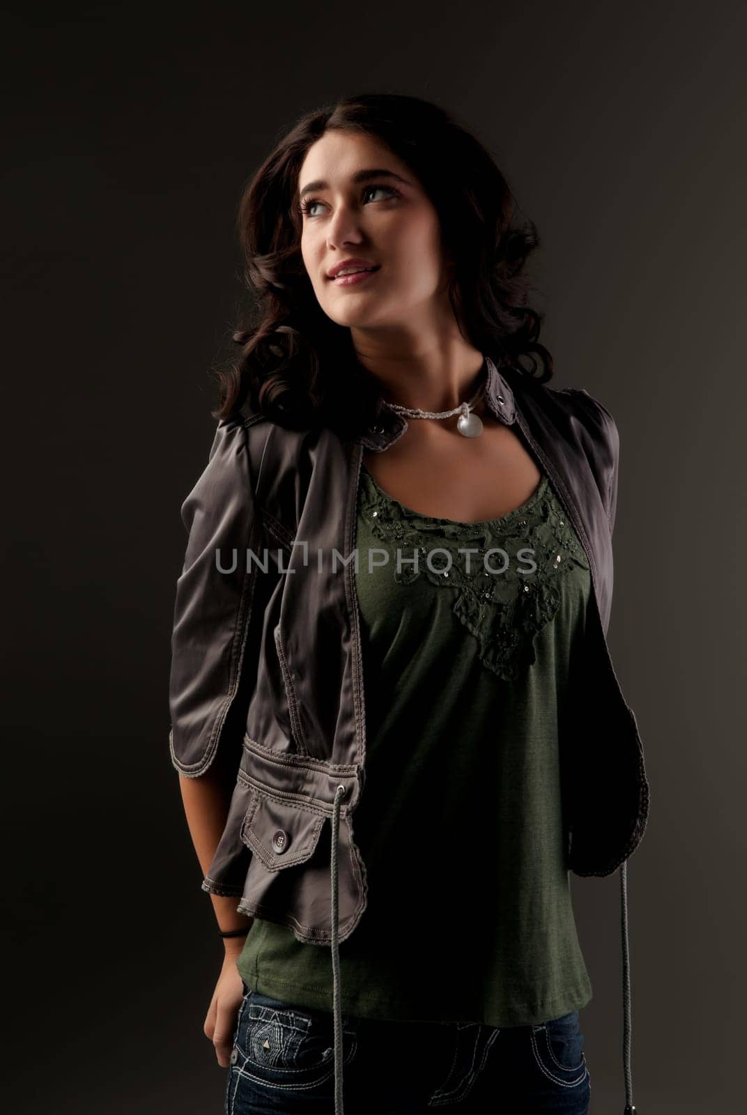 beuatiful young fashion teenager on dark gray