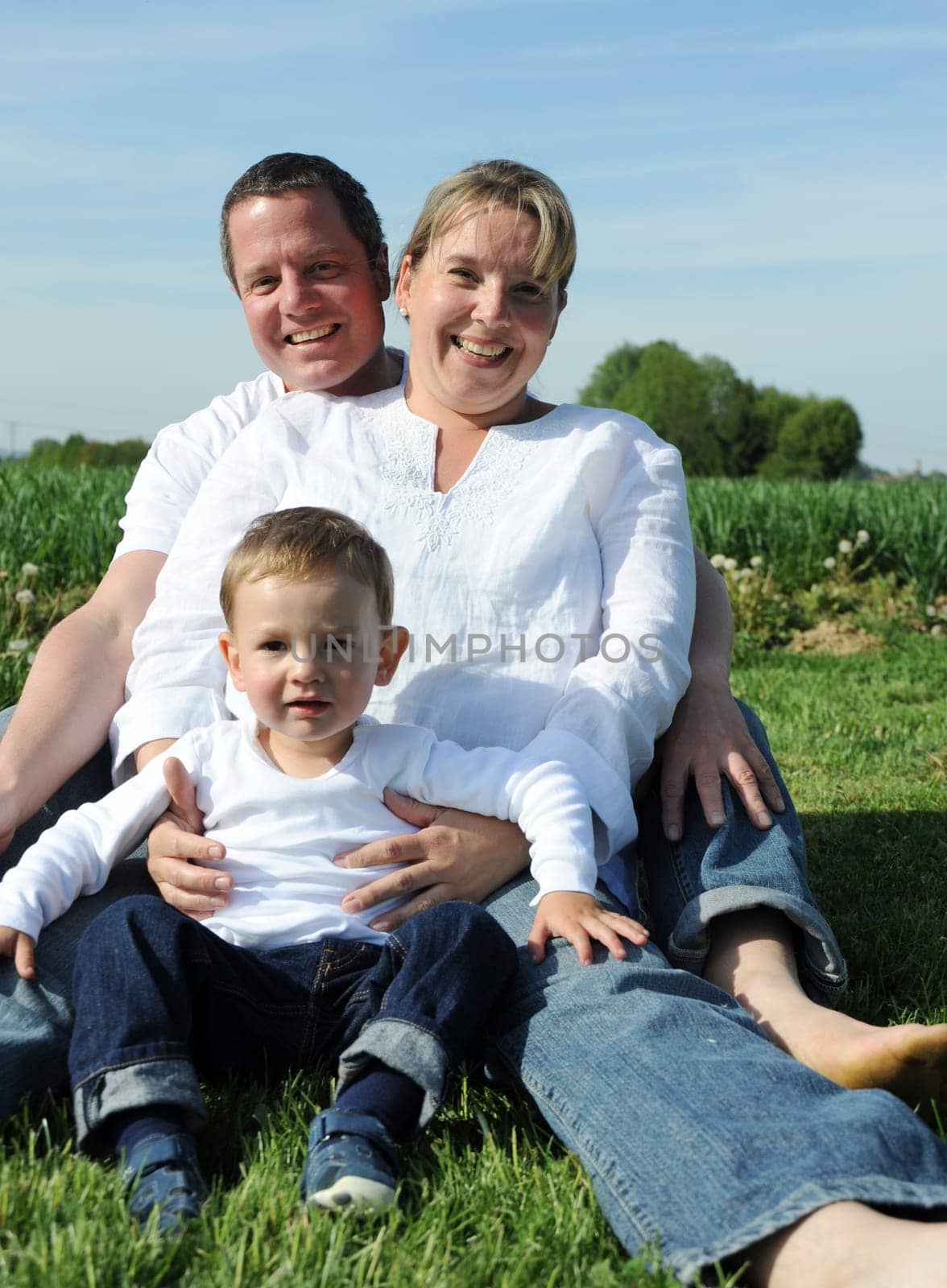 Happy young family with toddler