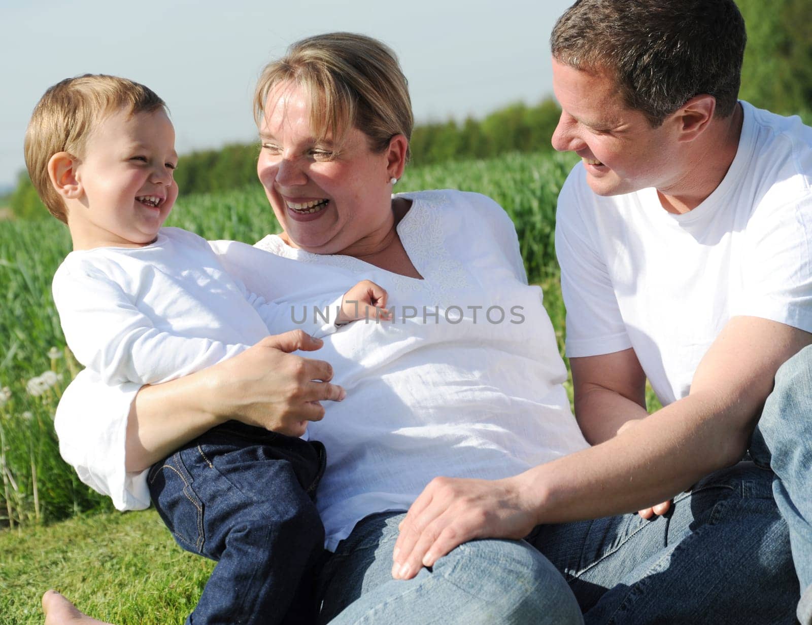 Happy young family with toddler