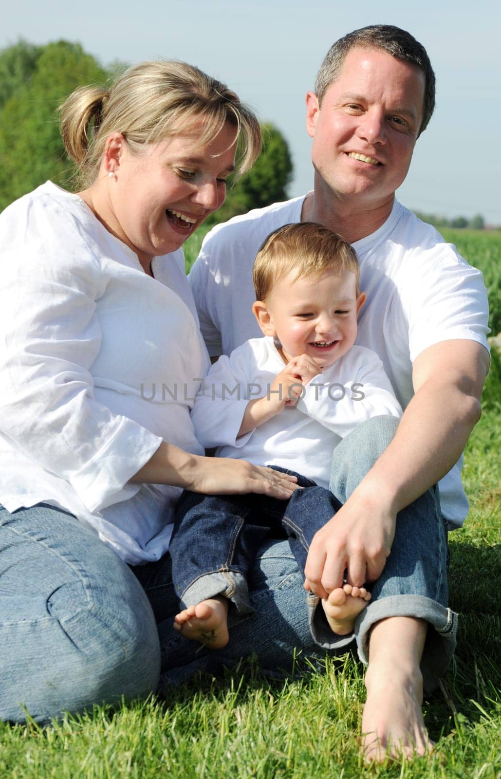 Happy young family with toddler