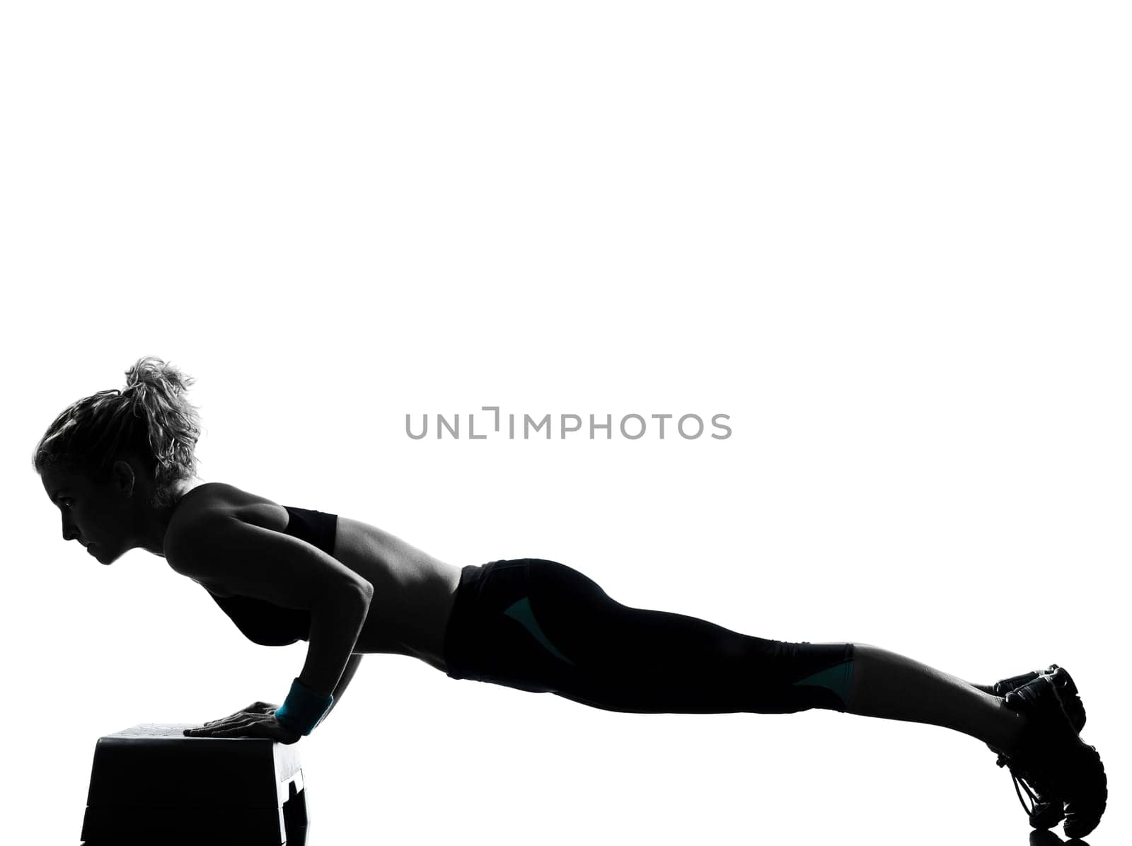 one woman exercising workout fitness aerobic exercise abdominals push ups posture on studio isolated white background