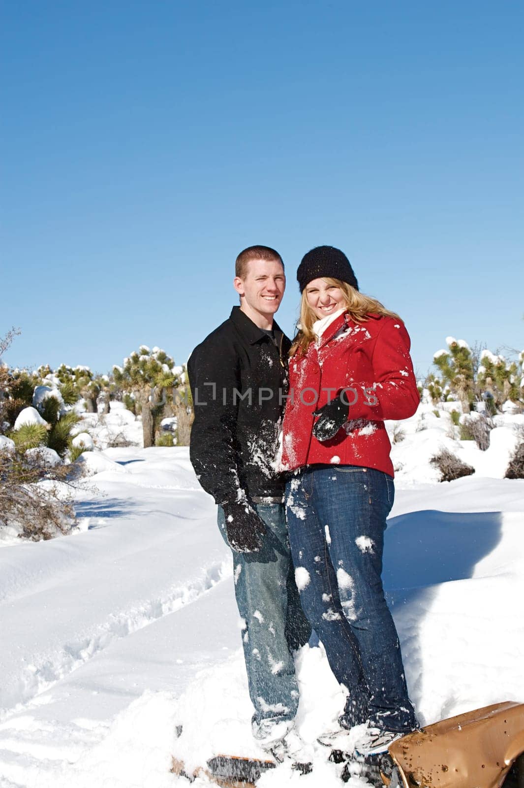 Young people enjoy a fresh snow fall