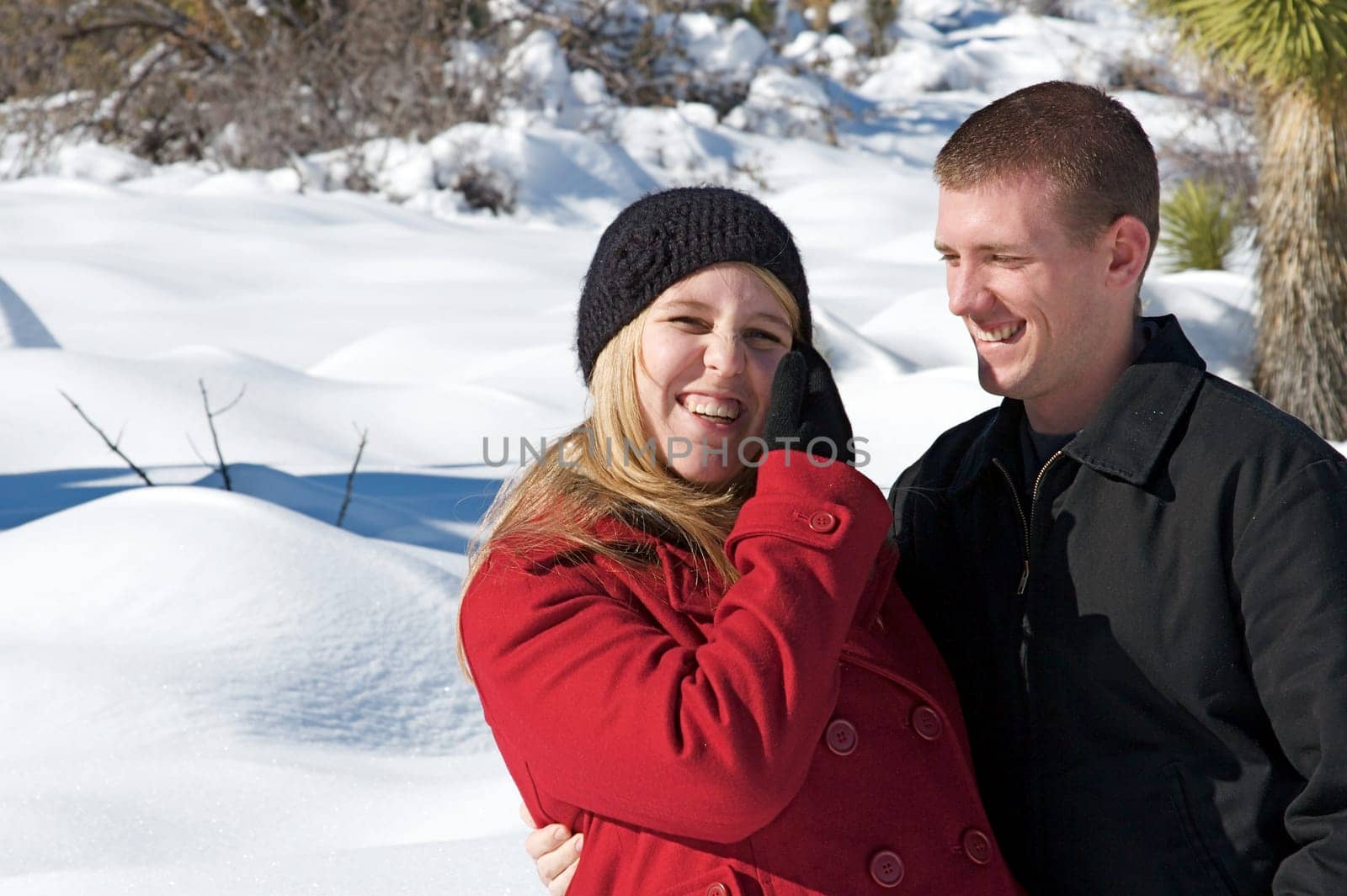 Young people enjoy a fresh snow fall