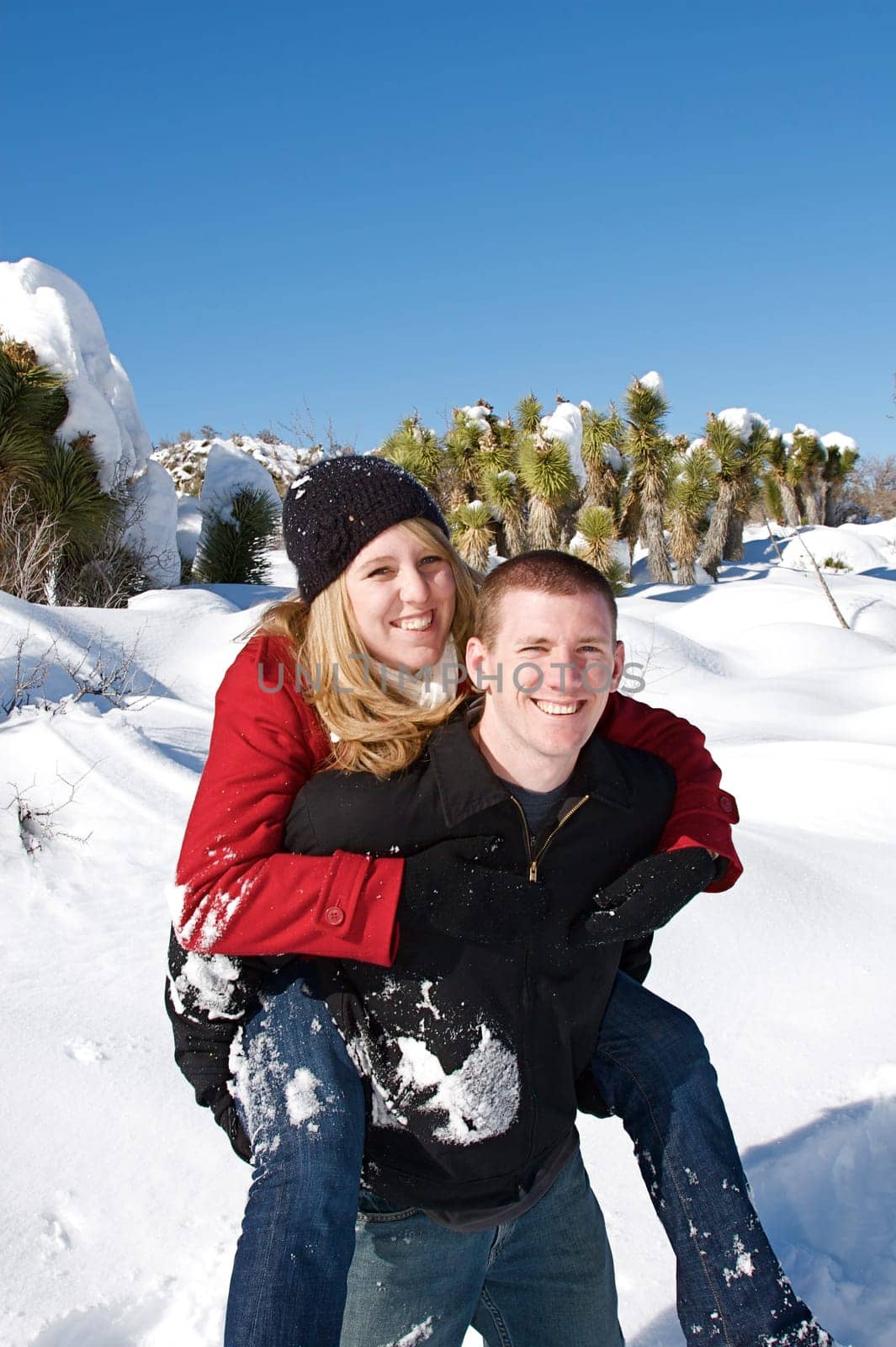 Young people enjoy a fresh snow fall