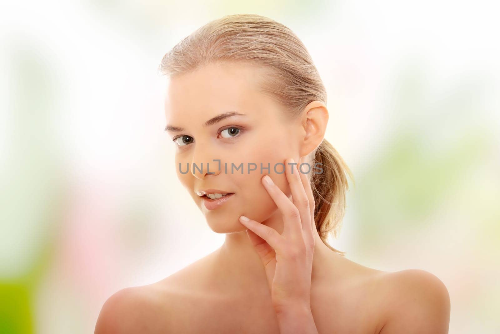 Portrait of the attractive girl without a make-up