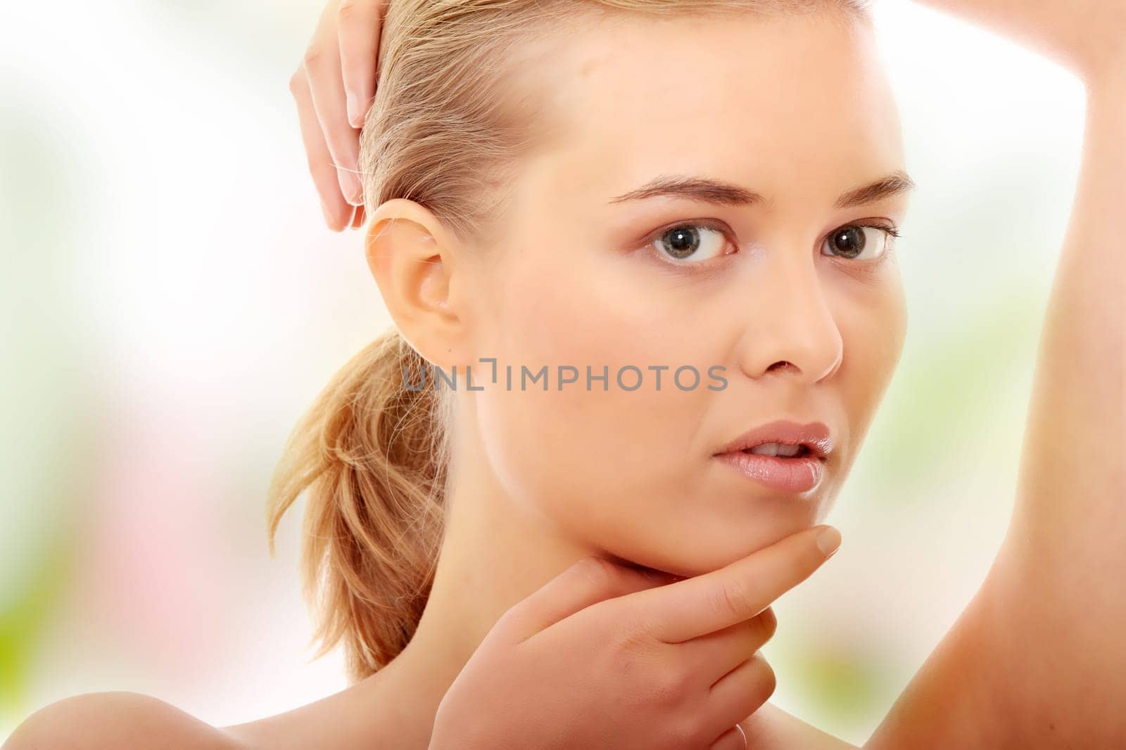 Portrait of the attractive girl without a make-up