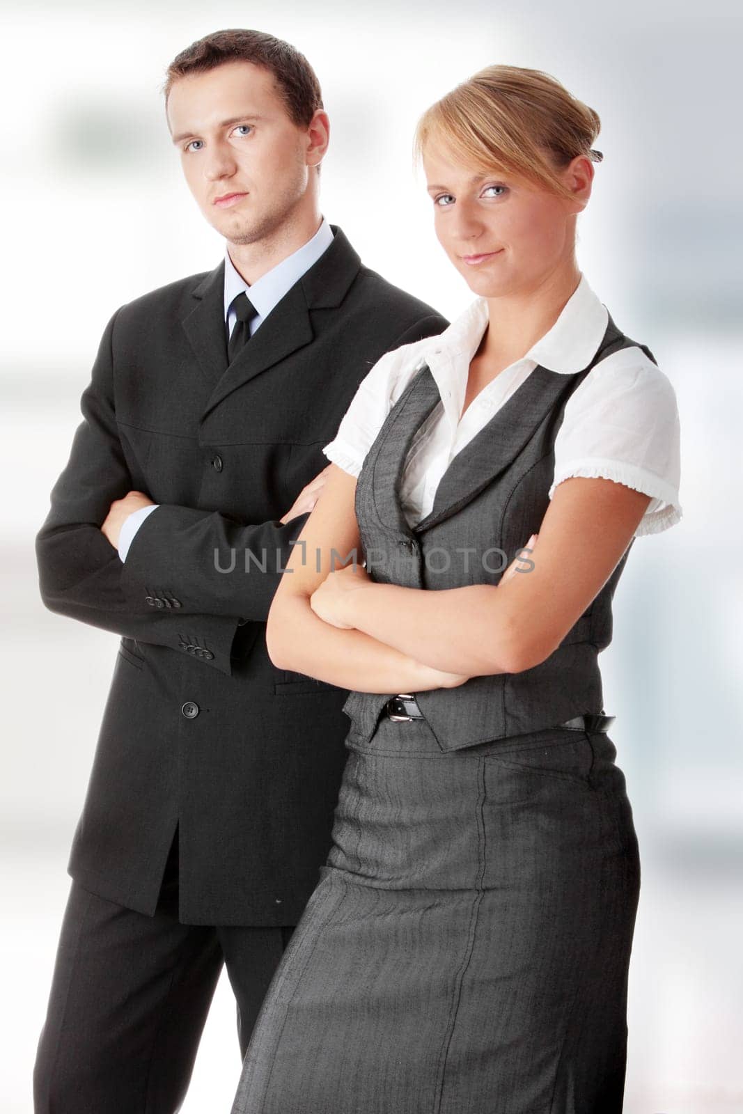 Young attractive business people isolated