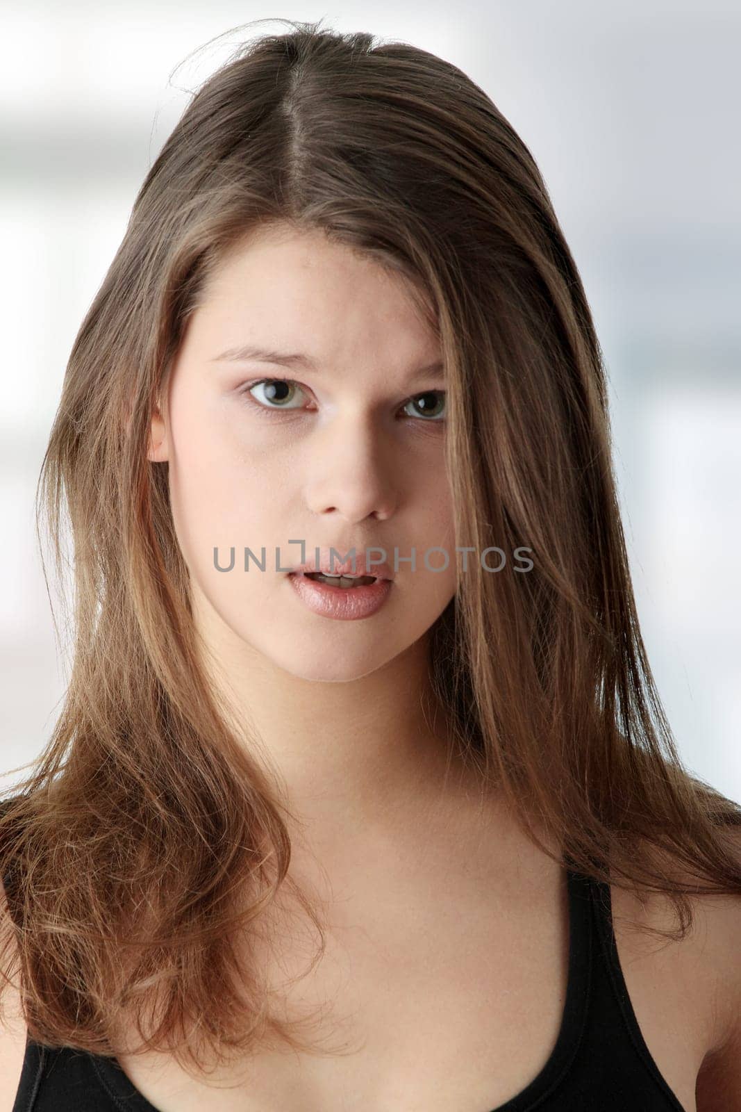 Woman portrait isolated over a white background