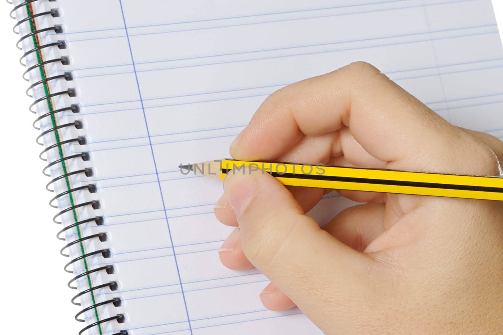 pencil and notebook over a white back ground