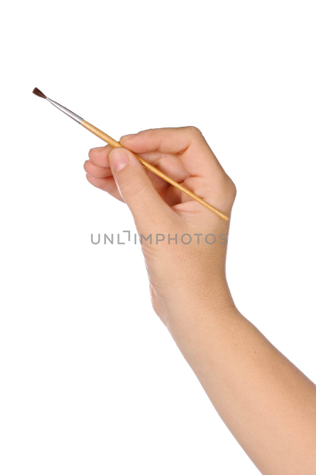 hand and brush over a white background