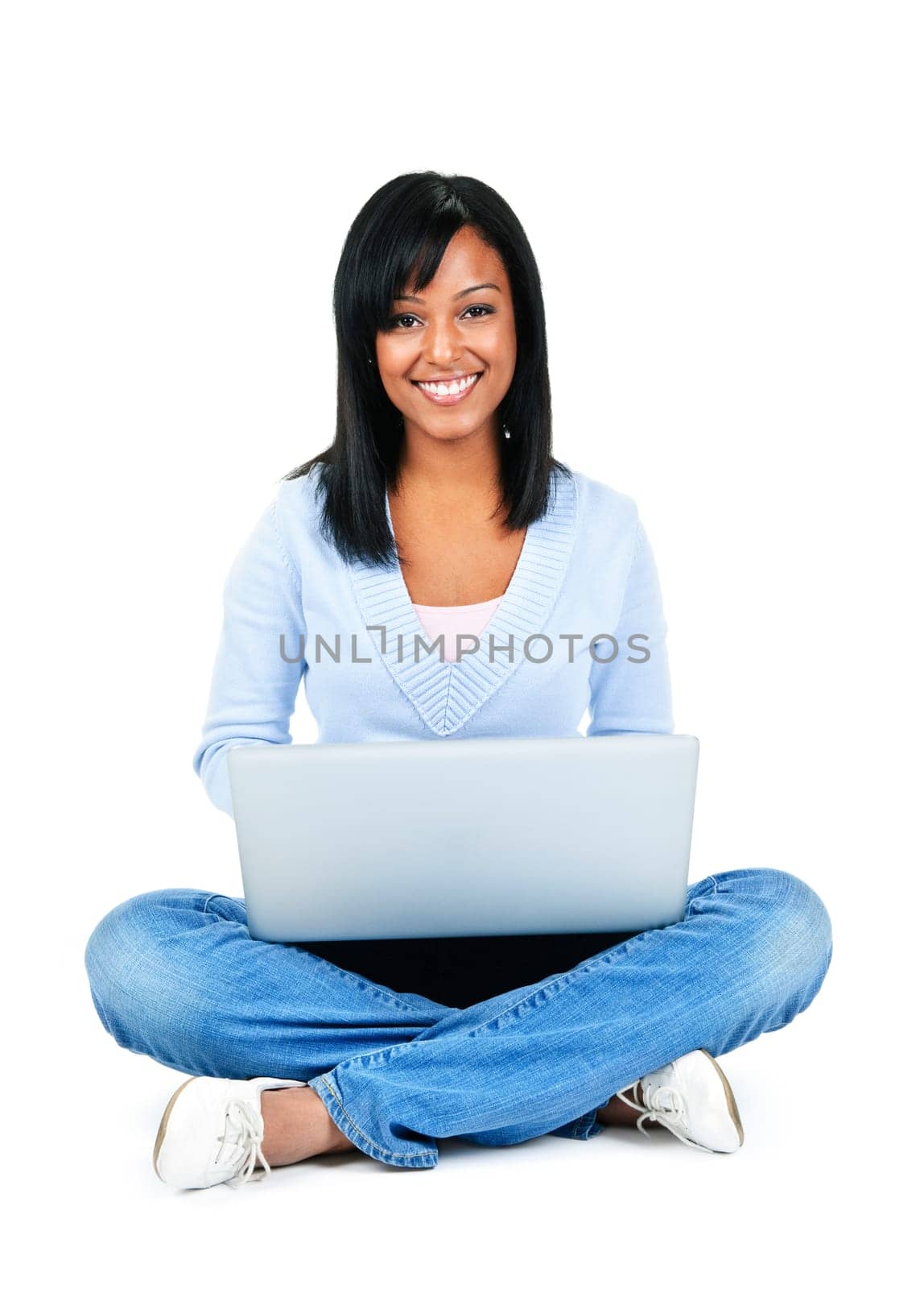 Happy black woman sitting with computer isolated on white background