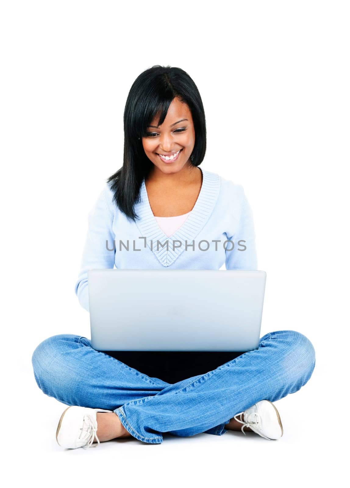 Happy black woman sitting with computer isolated on white background
