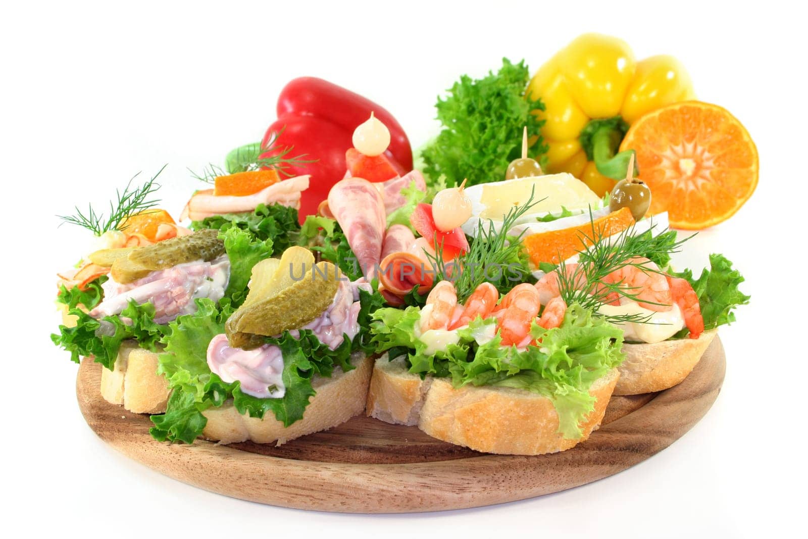 Various canapes against white background